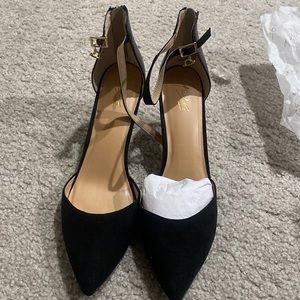 Thalia Sodi, black heels sz 12.